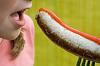 Girls and FOOD !  Padma Lakshmi eating chocolate ...-eating-sausage.jpg