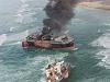 NAVY, exploding ship, oil spills, the New Carissa runs aground-newcarissabrokenandburning.jpg